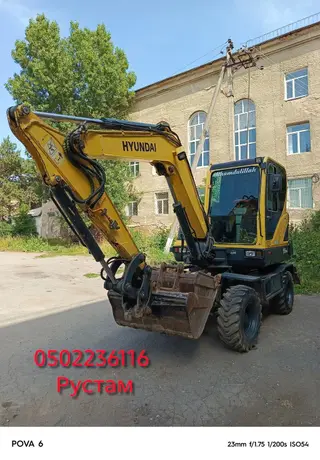 Услуги экскаватора в Караколе