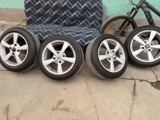 Комплект автомобильных колес на литых дисках. - Количество: 4 шт. -