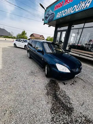Mitsubishi Lancer: 2004 г., 1.6 л, Типтроник, Бензин, Универсал