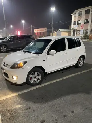 Mazda Demio: 2004 г., 1.5 л, Механика, Бензин, Хэтчбэк