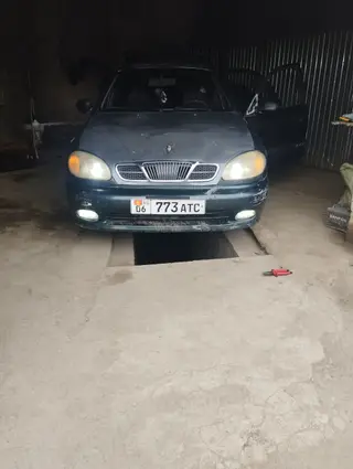 Daewoo Lanos: 1999 г., 1.5 л, Механика, Бензин, Седан