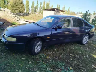 Mazda 626: 1994 г., 1.8 л, Механика, Бензин, Седан