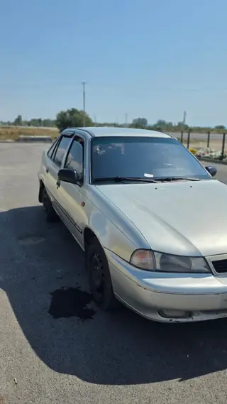 Daewoo Nexia: 2006 г., 1.6 л, Механика, Бензин, Седан