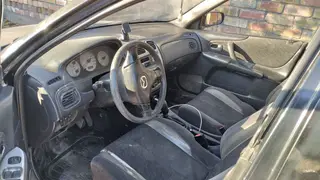 Mazda 323: 2000 г., Механика, Бензин, Универсал