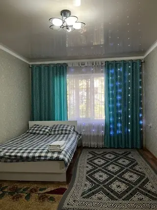 Уютная однокомнатная квартира с современной отделкой. В спальне