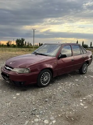Daewoo Nexia: 2010 г., 1.5 л, Механика, Бензин, Седан